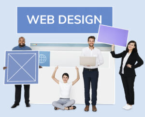 happy-diverse-people-holding-wed-design-board
